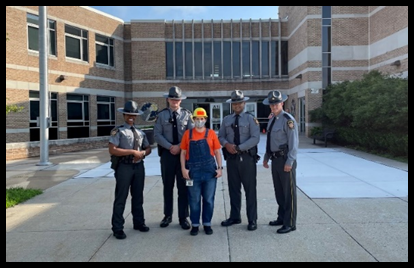 teacher with state police first day of school